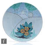 Wadeheath - A 1930s Art Deco Flaxman charger decorated with a stylised flower and trees against a