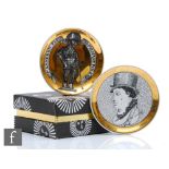 Fornasetti - Two boxed pin dish coasters, the first from the Double Face series, the other titled