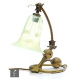 W A S Benson - An early 20th Century Arts and Crafts brass lamp bass with heart shaped base and an