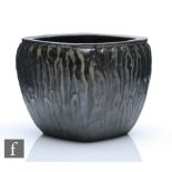 Martin Brothers - A small early 20th Century fern or cache pot decorated in a black tenmoku glaze
