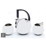 Oliver Hemming - A stainless steel three piece IO teaset comprising 18/10 tea pot, milk jug and