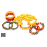 Unknown - A collection of post war lucite and plastic jewellery comprising five bangles, two