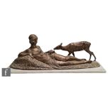 Demetre Chiparus (1886-1947) - Reclining partially clad female figure feeding a deer,