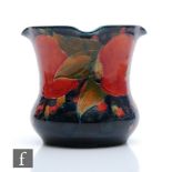 William Moorcroft - A small jardiniere or fern pot decorated in the Pomegranate pattern with a