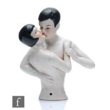 Unknown - A 1920s Art Deco German half doll, the porcelain figure modelled as an embracing couple,