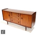 John Herbert - A. Younger Ltd - A post war Volnay range teak sideboard circa 1970, fitted with an