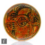 Poole Pottery Studio - An 8 inch plate decorated with an abstract 'Town Planning' design in dark