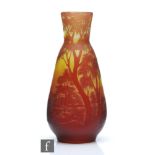 Galle - An early 20th Century cameo glass vase of compressed ovoid form with flared collar neck