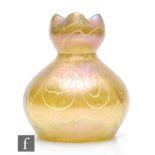 Loetz - An early 20th Century glass vase of shouldered ovoid form with quatrefoil neck, decorated in