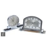 Enfield Clock Company - A 1930s Art Deco desk clock, the circular dial supported by two shaped feet,