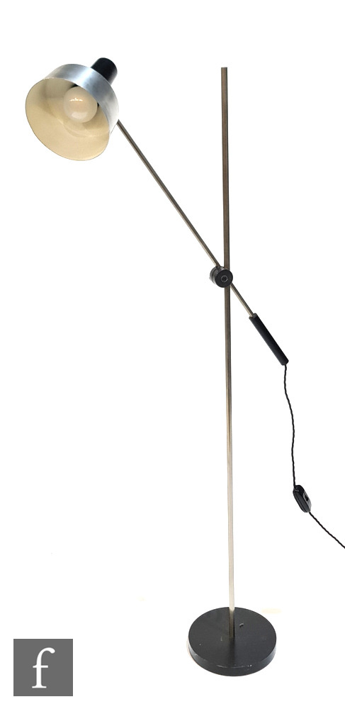 J. Hoogervorst - Anvia - An adjustable alumimium floor lamp over a circular cast iron base.