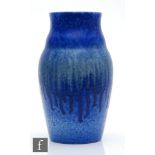 Ruskin Pottery - A large crystalline glaze vase decorated in a blue over green to blue with