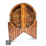 Unknown - A walnut veneered Alarm Clock display cabinet, with bar glazed double doors over a stepped