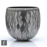 Nicola Richardson - A hand thrown studio pottery vase of cylindrical form, the body decorated with