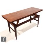 Niels Bach - Randers Mobelfabrik - A Danish teak metamorphic coffee table of rectangular form on H-