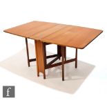 Tom Robertson - McIntosh of Kirkcaldy - A teak drop leaf dining table with strut type end supports