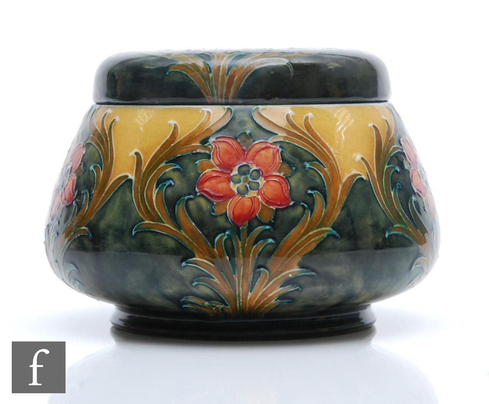William Moorcroft - James Macintyre & Co - An early 20th Century tobacco jar and cover decorated