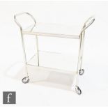 Sylvan Design - A mirrored two tier drinks or serving trolley on tubular aluminium frame with swivel