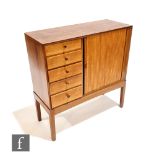 Chris Berry (1932-2014) - A mid 20th Century walnut cabinet, fitted with an arrangement of five