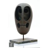 Bayard Osborn (1922-2012) - Mask within a skull, bronze, mounted on an iron stand and square