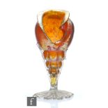Loetz - An early 20th Century glass vase formed as a conch shell in the Creta Papillon pattern