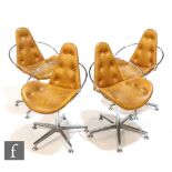 In the manner of Pieff Furniture - Four tan vinyl upholstered swivel chairs, with chromium plated