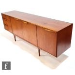 Tom Robertson - McIntosh of Kirkcaldy - A teak Dunvegan sideboard, fitted with a central double door