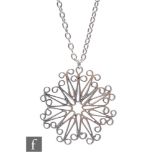 Jack Spencer - A modernist silver pendant on chain, the circular pendant with openwork abstract