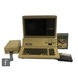 An original Apple III computer complete with manuals.