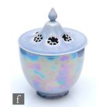 A Ruskin Pottery eggshell pot pourri vase and cover decorated in an all over lavender lustre, the