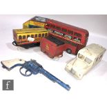 A Triang Minic tinplate clockwork Double Decker Bus circa 1950, in red with cream upper deck