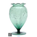 A late 19th Century Stevens & Williams vase of shouldered ovoid form with a frill rim, falling to