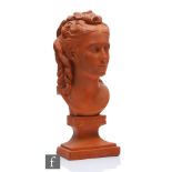 A late 19th Century Watcombe Pottery terracotta bust of Princess Louise on an affixed plinth,