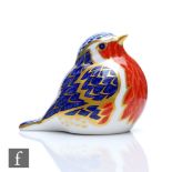 A Royal Crown Derby paperweight modelled as a robin, printed mark, gold stopper.