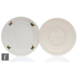 Two Belleek Christmas plates, the first for 1981 with a squirrel nibbling nuts, the second for