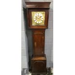 A 19th Century oak longcase clock with later associated eight-day movement