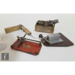 An IM Pointmaster gramophone needle sharpener, two gramophone reproducers and brushes, a telephone