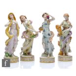 A set of four Sitzendorf allegorical figures depicting the four seasons, printed marks, tallest 23.