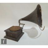 An HMV gramophone with original wooden horn, exhibition sound box on mahogany base A/F and a leather