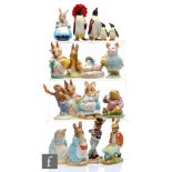 A collection of Beswick, Royal Doulton and Royal Albert figurines comprising a Penguin family, the