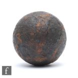 An English Civil War cast iron cannonball, reputedly found at the site of the battle of Edgehill,