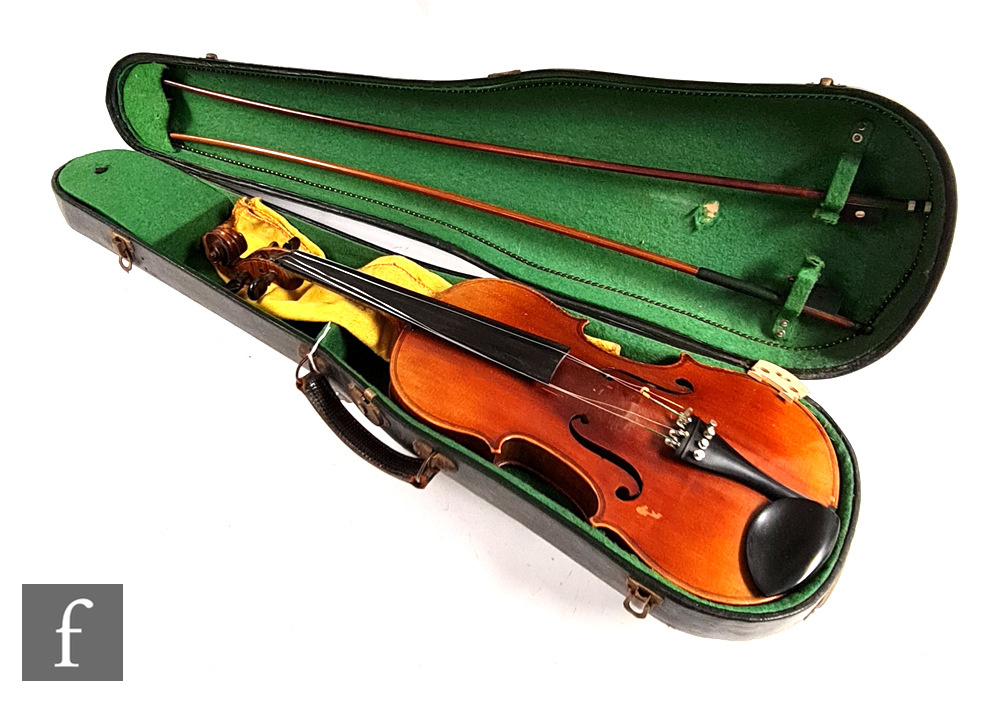 A 20th Century violin labelled JTL Vitouse, length 36cm, with two bows, cased.