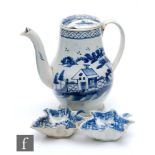 A 19th Century pearlware coffee pot decorated in blue and white with a cottage and fence