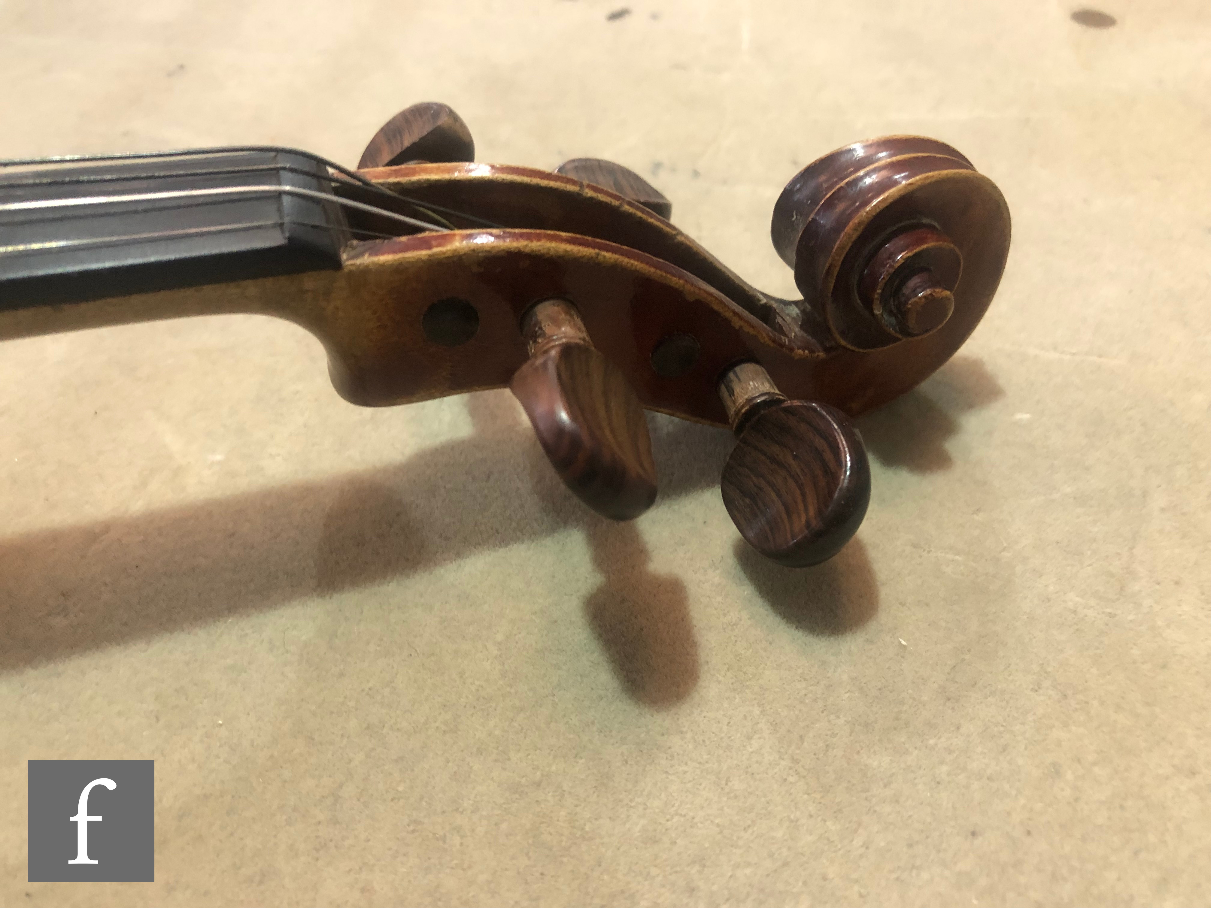 A late 19th early 20th Century violin, length 34cm, with bow, in modern blue zip case and with - Image 8 of 15