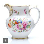 A mid 19th Century Coalport jug decorated with hand painted sprays of flowers with gilt detailing