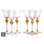A married set of six Italian Venetian wine glasses in the manner of Salviati, the tapered