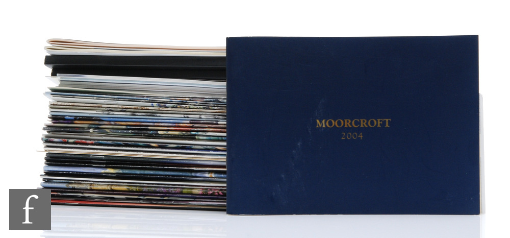 A collection of assorted Moorcroft Collectors Club magazines and yearly pamphlets. (qty)