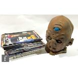 A reproduction Davros mask, S/D, ten issues of the Skaro fanzine, several issues of DWB magazine
