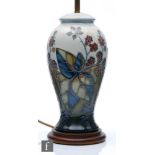 A Moorcroft Pottery table lamp decorated in the Bramble pattern designed by Sally Tuffin, marks