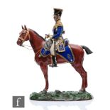 A large Sitzendorf model of soldier on horseback, painted to the underside 17th Lancers 1815,